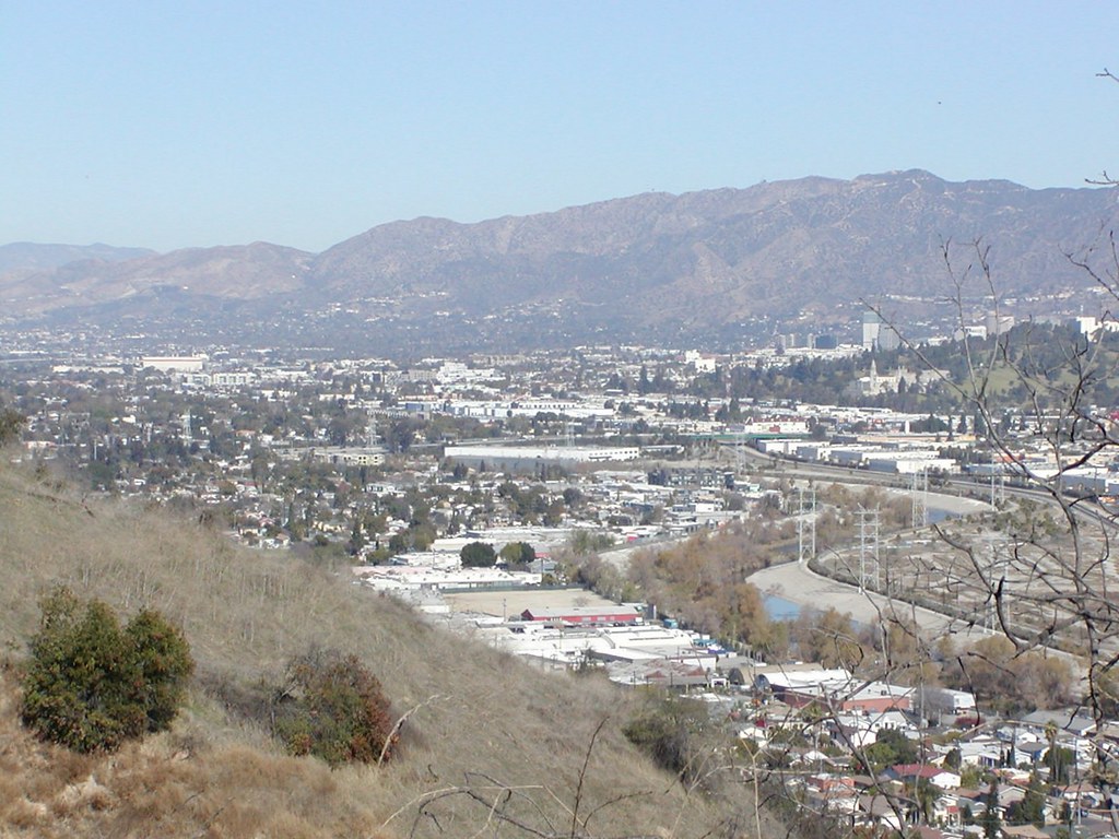 a view of a city from a hill