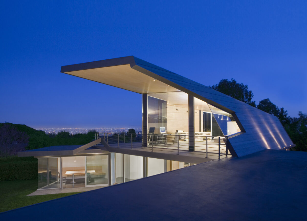 two level modern luxury home with large glass windows