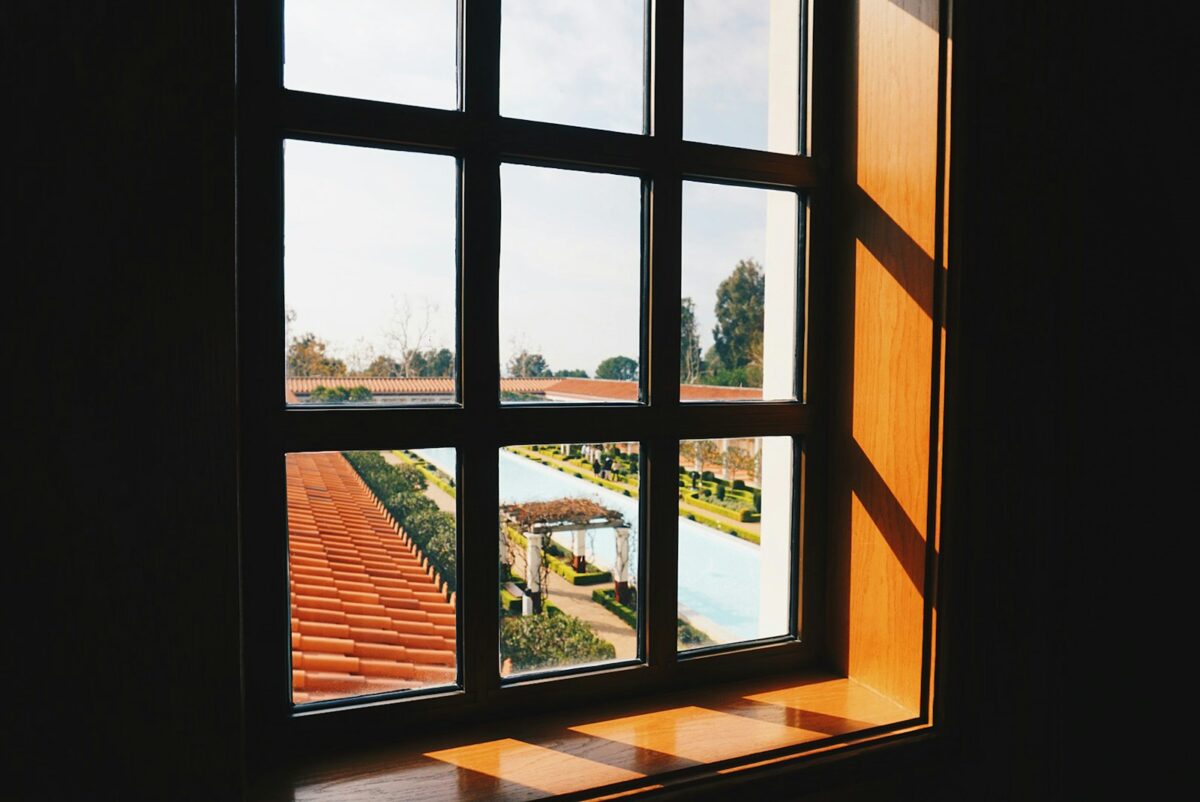 a view of a pool through a window