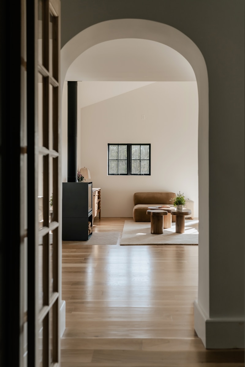 A hallway leading to a living room and dining room