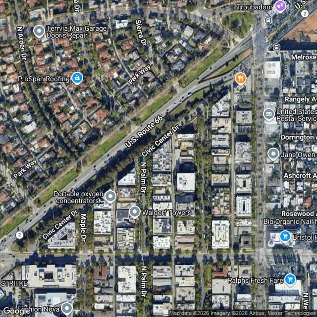 Modern luxury condominium building at 460 N Palm in Los Angeles featuring contemporary architecture and elegant design.