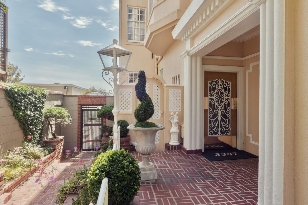 Elegant gated luxury home entrance in Los Angeles with secure property gates