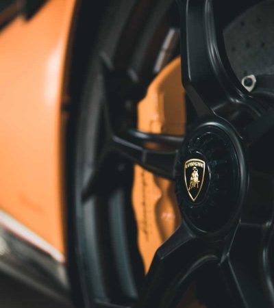homes for sale with car elevator a close up of a wheel on a sports car