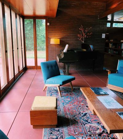 frank lloyd wright los angeles homes blue and brown chair beside brown wooden table