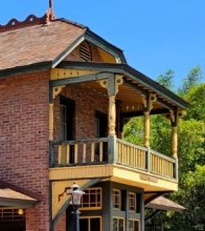 Arcadia a brick building with a balcony