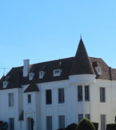 a white house with a pointed roof