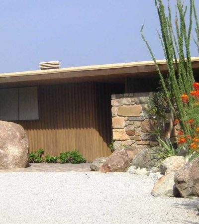 Edward Fickett brown and biege mid century home with green and red flowers