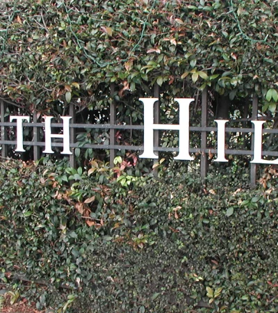 North Hills a sign on a fence