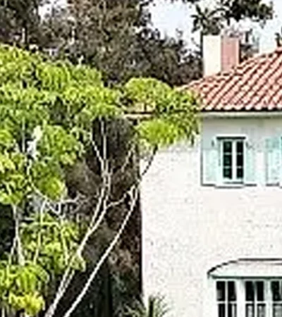 Olympic Park a white building with a red roof and a green roof