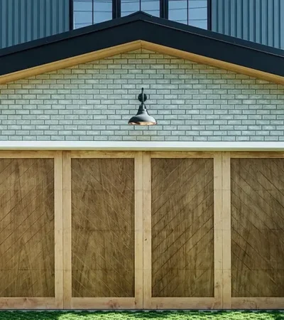 a garage door with a light above it