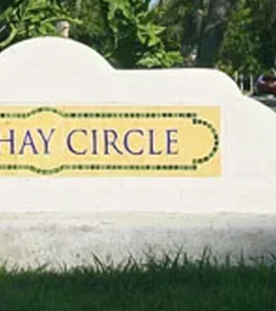 a sign on a stone