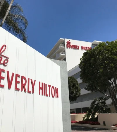 Welton Becket the sign at the Beverly Hilton and hotel in background