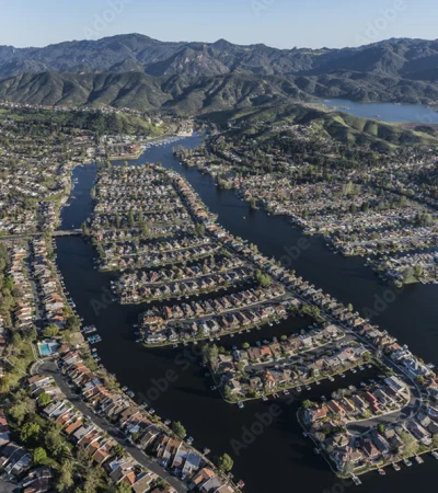 a aerial view of a town surrounded by water
