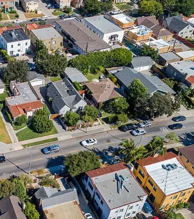 Wilshire Vista Heights aerial view of a neighborhood with cars and buildings