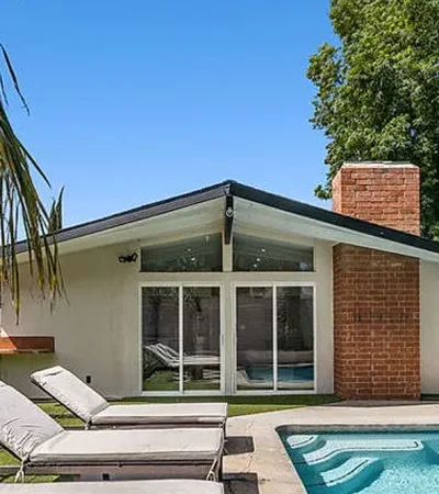 a pool in the backyard of a house