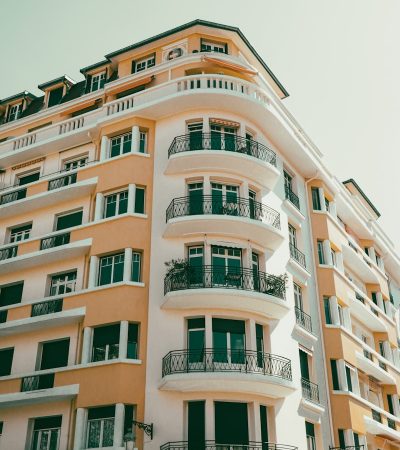 sherman oaks condos for sale  a tall building with balconies and balconies on the top of it