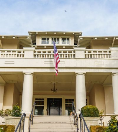 Luxury Americana-style home in Los Angeles showcasing classic architectural details and elegant curb appeal