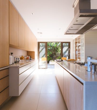 studio city luxury homes for sale white wooden kitchen island and cupboard cabinets near glass panel door