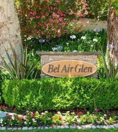 a sign in a garden