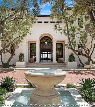 a fountain in front of a building