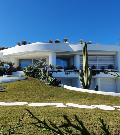 gated encino homes for sale white concrete building under blue sky during daytime