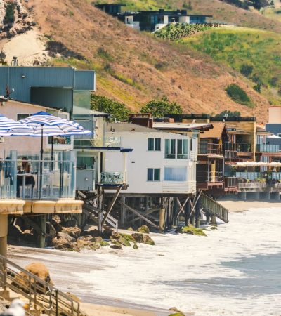Stunning beachfront luxury home at Broad Beach in Malibu, California showcasing modern coastal architecture