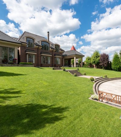 Elegant luxury home in Burlingame Gardens, CA with manicured landscaping and modern architecture