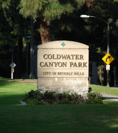 a sign in a park