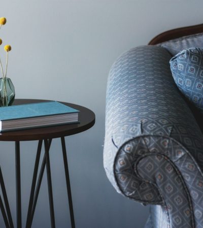 traditional homes for sale in los angeles blue book on round brown end table near sofa