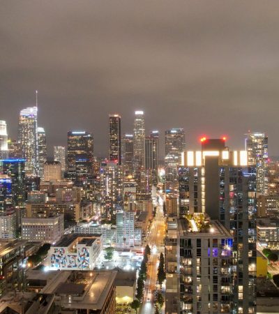 Modern downtown Los Angeles condo with floor-to-ceiling windows and city skyline views