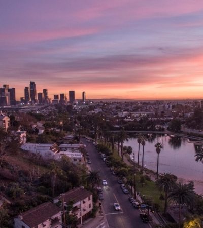 echo park a city with a body of water and a pink sky