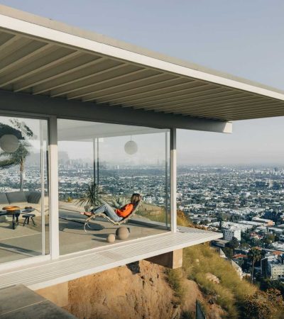 homes for sale jetliner views a person sitting on a balcony overlooking a city