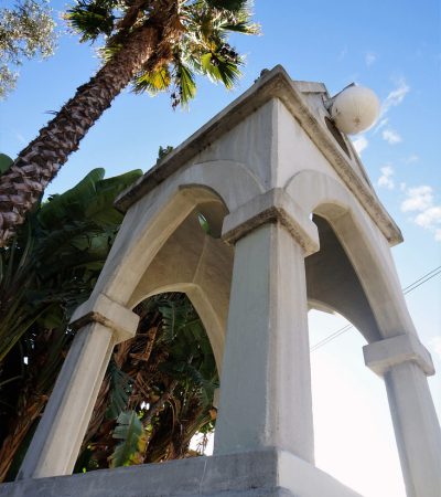 franklin hills a white structure with arches and a ball on top