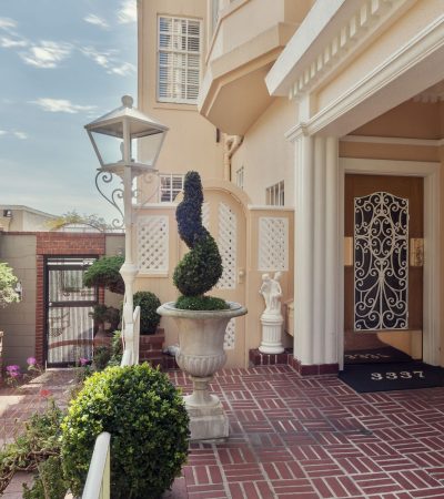 Elegant gated luxury home entrance in Los Angeles with secure property gates