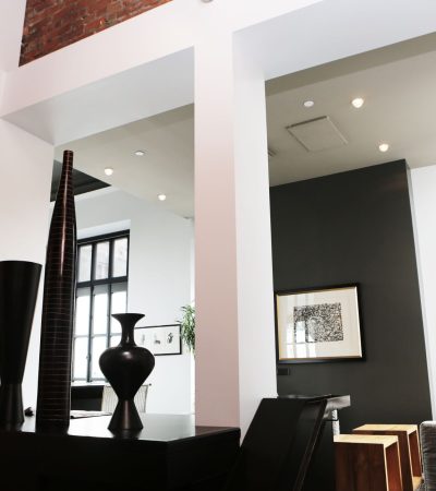 Spacious modern loft in Hollywood, California featuring exposed brick and industrial design elements
