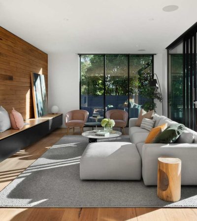 clive wilkinson design gray sectional couch on gray carpet