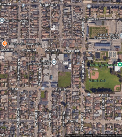 Luxury homes in La Colonia, Los Angeles neighborhood featuring Spanish colonial architecture and lush landscaping