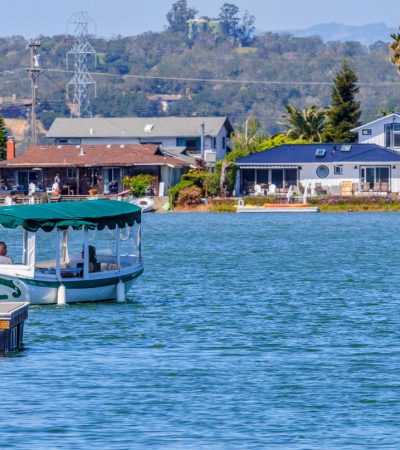 Stunning lakeside luxury home in San Mateo, California featuring modern architecture and waterfront views