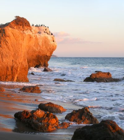 Stunning beachfront view of Las Tunas Beach in Malibu, California, showcasing luxury coastal real estate opportunities