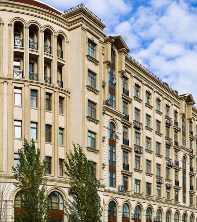 Elegant luxury condominium building in Los Angeles featuring French-inspired architecture and high-end finishes