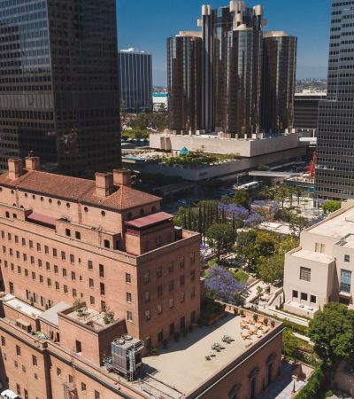 Modern luxury condominium building in Los Angeles with contemporary architecture and city views