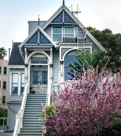 victorian homes for sale in los angeles white and gray wooden house near pink flowers