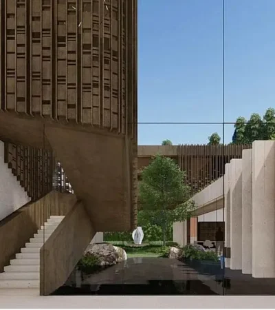 a building with stairs and a pond