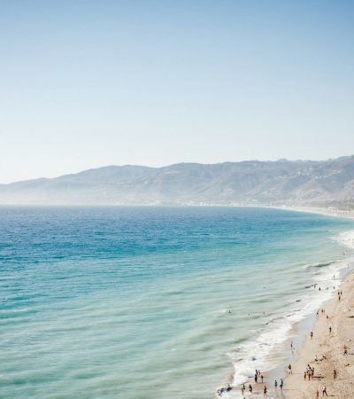 aerial view of beach with blue ocean water during daytime