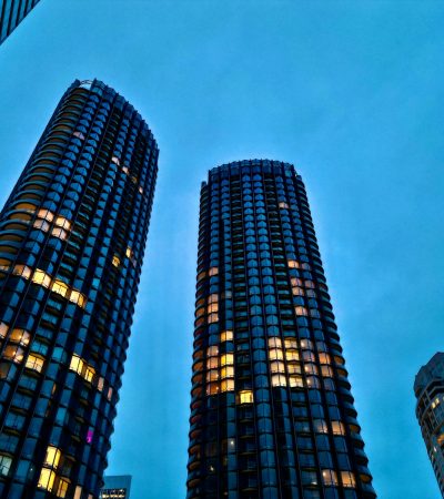 century city condos for sale a couple of tall buildings sitting next to each other