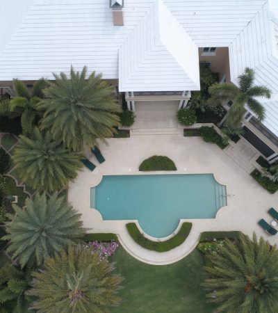 aerial view photography of white house near swimming pool