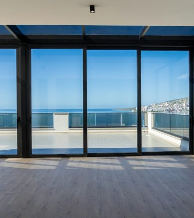 condos for sale in los angeles county an empty room with a view of the ocean