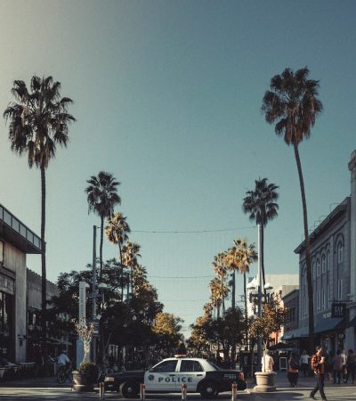 Wilshire Montana cars parked on street near building during daytime