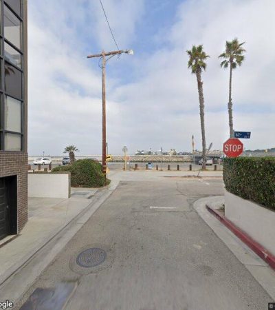 Street view of luxury Santa Barbara beachfront homes and coastal neighborhood with ocean views