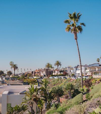 Luxury home exterior in Seneca Village, Chino featuring modern architectural design and manicured landscaping